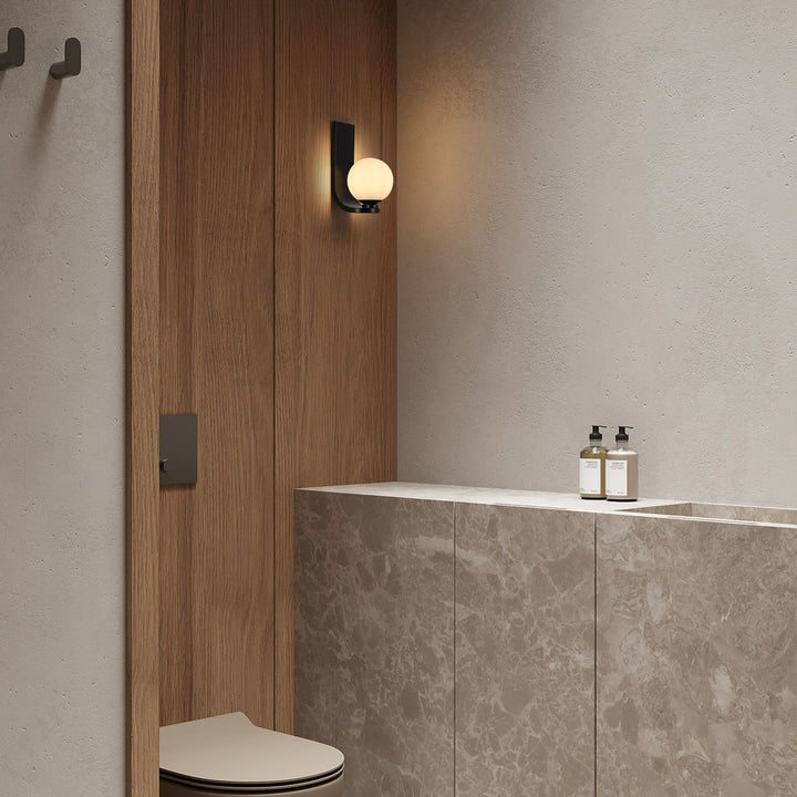 Tranquix 1-Light Matte Black J-Shaped Wall Sconce (8") Brightelier