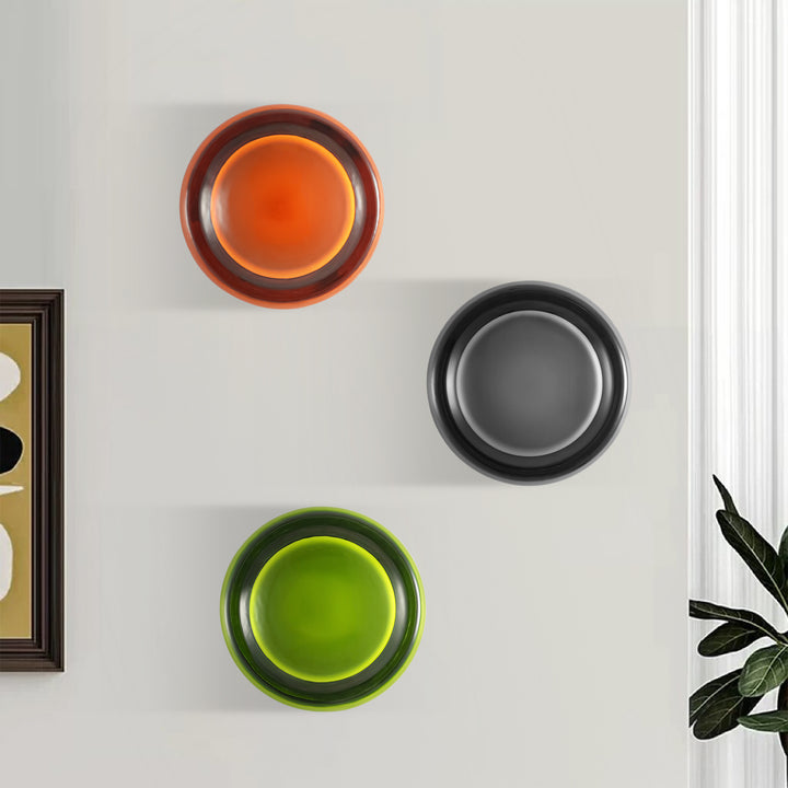 Adorn your walls with the Modern Minimalist Round Dimple Wall Lamp, a masterpiece of understated elegance. Its circular form and subtle dimpled texture create a harmonious interplay of light and shadow. This round acrylic lamp’s refined simplicity and diffused glow elevate contemporary interiors, offering both style and tranquility to your living environment.